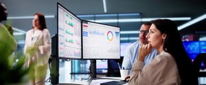 Operations leader reviewing manufacturing KPI dashboard powered by Fact-Trak and SyteLine